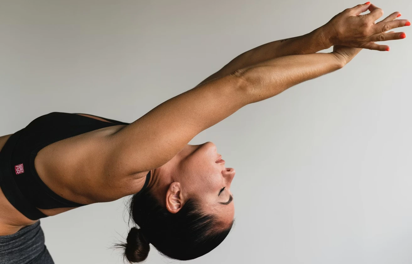 women streching at a pilates studio